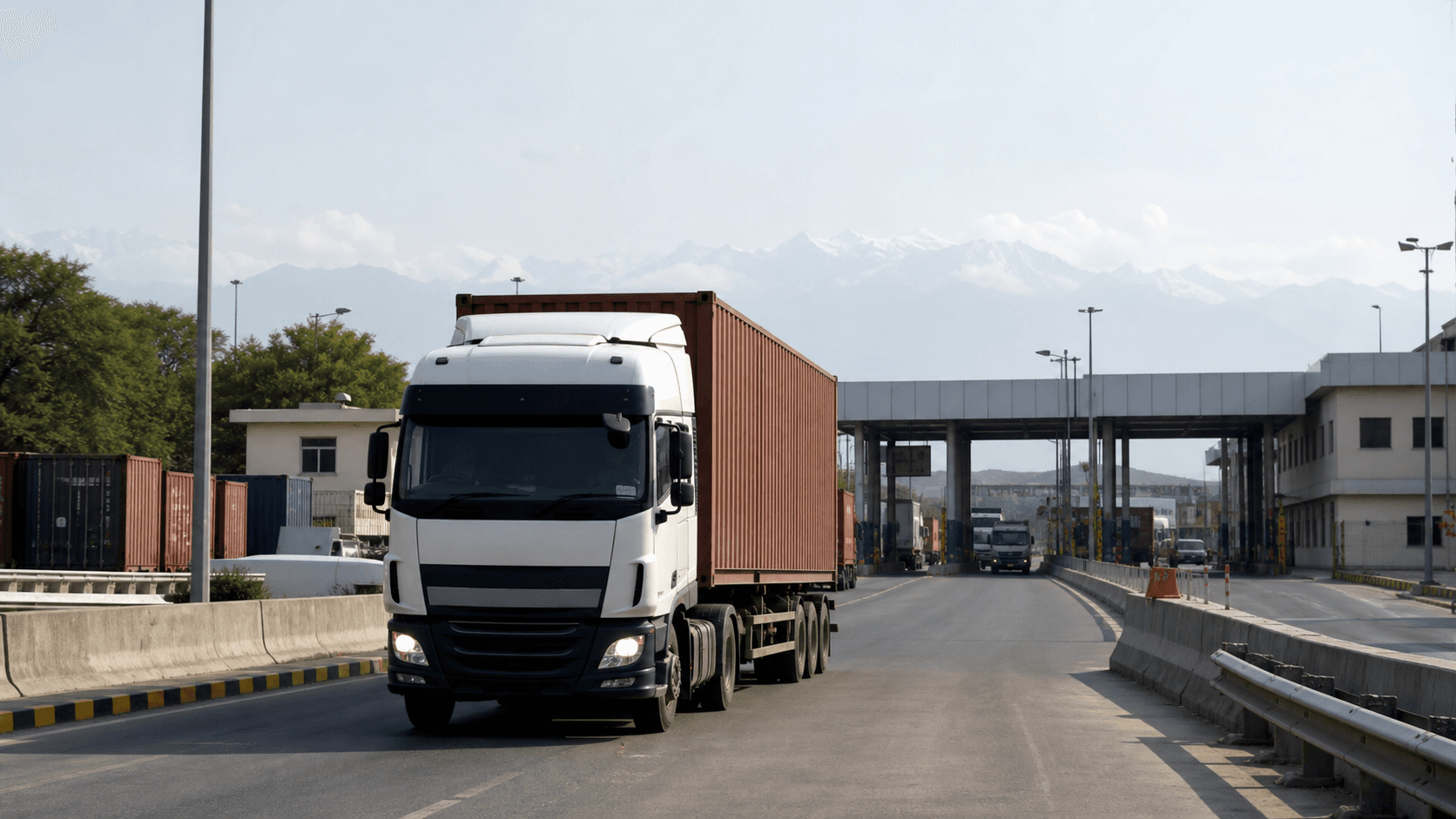 Commercial freight truck moving cargo through an India-Nepal land-border corridor