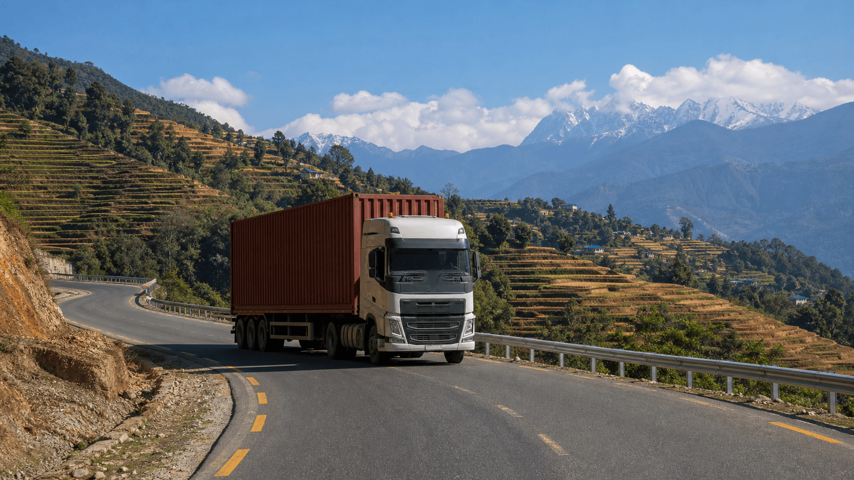 Container truck carrying commercial cargo along a mountain highway in Nepal